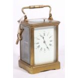 Early 20th century French brass repeating carriage clock, with Roman enamel dial,