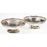 Pair of silver pedestal bonbon dishes, with pierced rims and faceted bowl, Birmingham 1931,