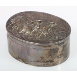 Victorian Scottish silver snuff box of oval form, the cover embossed with a smoking scene,