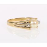 18 carat gold diamond and pearl ring, marked 18ct, ring size P.