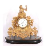 19th century French gilt spelter mantel timepiece, with enamel Roman dial and key cylinder movement,