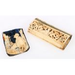 Early European carved bone snuff box in the form of a book, with figure and foliage panel, 7.