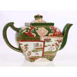 Masons double landscape ironstone teapot decorated on a dark green glaze,