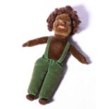 Norah Wellings black girl doll wearing green trousers and braces