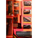 Fifty-five Hornby OO gauge model railway wagons, rolling stock and other accessories.