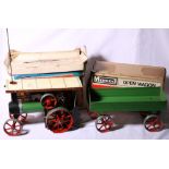 Mamod TW1a steam tractor and accompanying OW1 open wagon, both boxed.