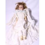 German bisque head doll with jointed kid limbs and body and porcelain lower arms, 46cm.