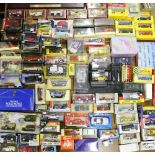 Approximately ninety Schuco, Lledo, Corgi, Maisto, Solido and other model vehicles, most boxed.