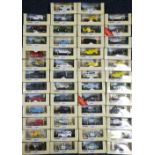 Fifty Corgi Classic vehicles, each boxed.