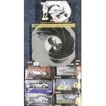 Seven Corgi James Bond themed model vehicles including CC99106 The Definitive Bond Film Canister