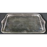 Rectangular silver tray with gadrooned border and shell cast serpentine handles, maker HM,