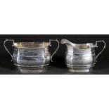 Silver sucrier and cream jug of rectangular form with beaded rim, maker RC, Birmingham 19254,