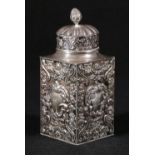 Silver tea caddy of embossed square form, maker William Comyns, Goldsmiths and Silversmiths Company,