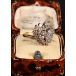 18ct gold forty-three stone diamond ring, the diamonds set in heart form, size M,