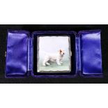 Enamelled cigarette case, the cover painted with a terrier, cased,