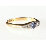 Eighteen carat gold sapphire and diamond ring seven stone ring, 2.