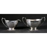 Silver sucrier and cream jug of faceted oval form, Sheffield,