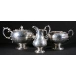 Victorian Scottish silver three-piece teaset comprising teapot, sugar and cream, maker J McKay,