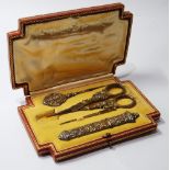 French early 20th century silver gilt necessaire à coudre comprising needle case, scissors,