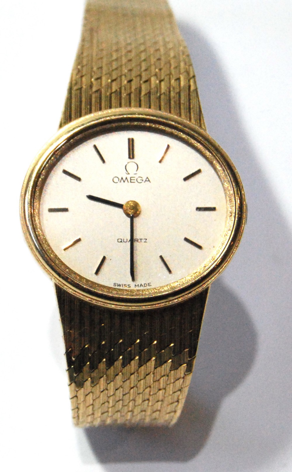 Lady's Omega quartz '375' gold bracelet watch, with box.