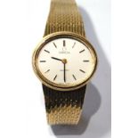 Lady's Omega quartz '375' gold bracelet watch, with box.