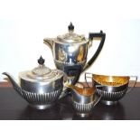 Silver four-piece tea set of oval part-fluted form, by Roberts & Belk, Sheffield 1910, 41oz.