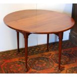 Mahogany 20th century oval gate-leg table, 102cm long, 94cm wide and 66cm high.