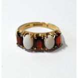 Opal and garnet five-stone ring in 9ct gold.