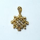 Victorian diamond and pearl pendant of square openwork form, an old-cut brilliant at the centre,