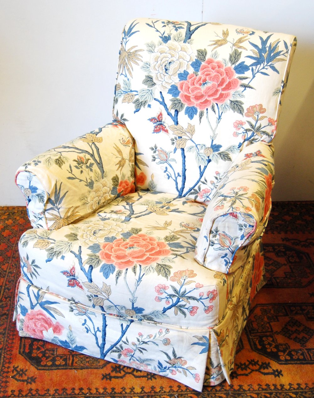 Edwardian armchair with loose cover.
