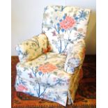 Edwardian armchair with loose cover.