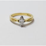 Diamond solitaire ring with marquise brilliant, in 18ct gold.