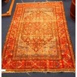 Antique Quashqui rug with lozenge on an indigo field within a triple boteh border, 189cm x 131cm.