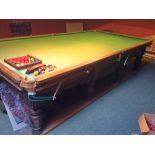 George Taylor of Edinburgh carved oak full-size snooker table with turned legs.