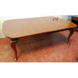 Edwardian mahogany wind-out dining table complete with handle and two additional leaves (51cm and