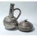 Indian silver embossed box and cover of compressed form and a similar flask with loop handle, 14oz.