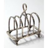 Silver miniature toast rack by Bradbury & Sons, Sheffield 1929, 6cm long.