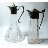 Two EP mounted glass claret jugs, one cut, the other moulded.