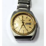 Gent's Bulova Automatic stainless steel watch with gilt dial and bezel, 1970s.