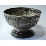 Silver embossed hemispherical bowl upon moulded foot by Nathan & Hayes, Chester 1904, 7oz.