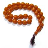 Amber bead necklace with drop.