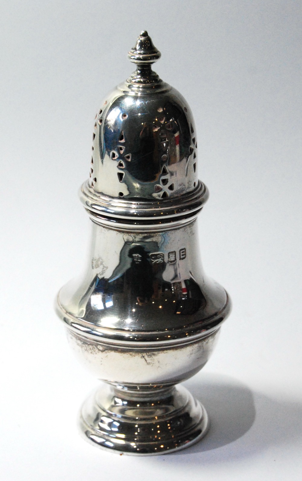 Silver baluster caster upon moulded foot, by E. Barnard, 1940, 6oz.