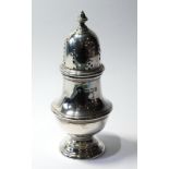 Silver baluster caster upon moulded foot, by E. Barnard, 1940, 6oz.