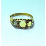 Ring with three opals and diamond points, in 18ct gold, 1902.