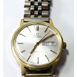 Gent's Omega Automatic rolled gold watch with day and date.