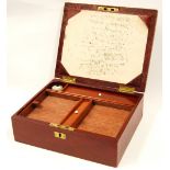 Early 20th century red leather writing box, 26cm long.