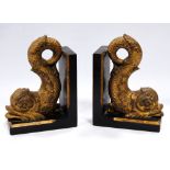 Pair of 20th century giltwood dolphin bookends, 17cm high.