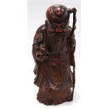 Carved bamboo figure of Shoulao, 20cm high.