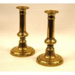 Pair of George III brass candlesticks, 19cm high.