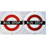 A pair of London Transport 'DOLLY STOP' enamel BUS STOP SIGNS, temporary bus stops used for